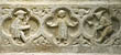 Panel 22:00 - Charity; central figure is holding out bowls to a pilgrim lleft) and a lame beggar (right)